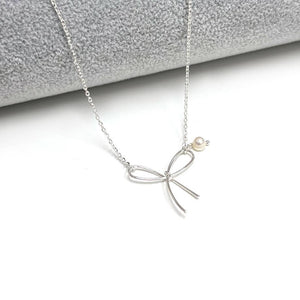 Bow Charm with Pearl Pendant Necklace